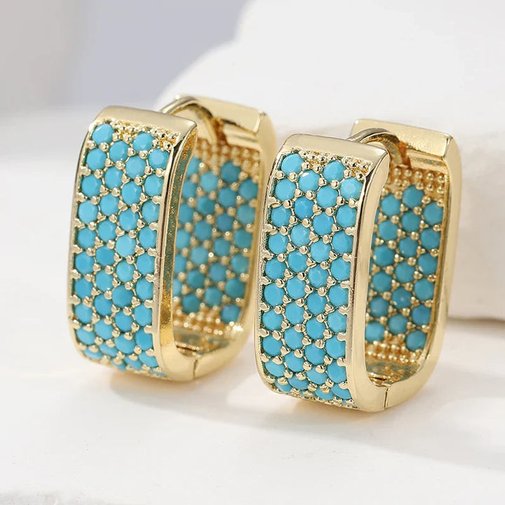 Turquoise Pavé gouden Huggie oorbellen