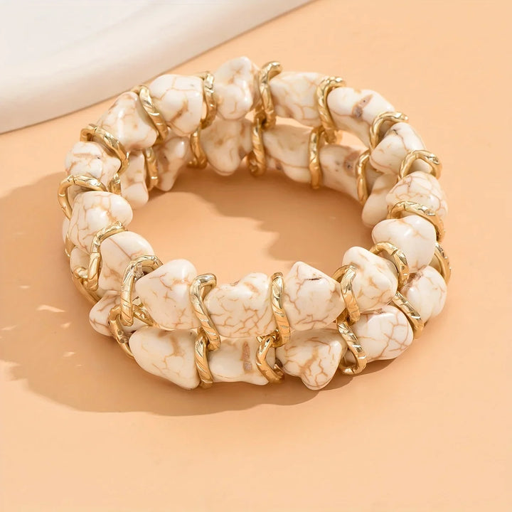 Gouden armband met turkooizen steen