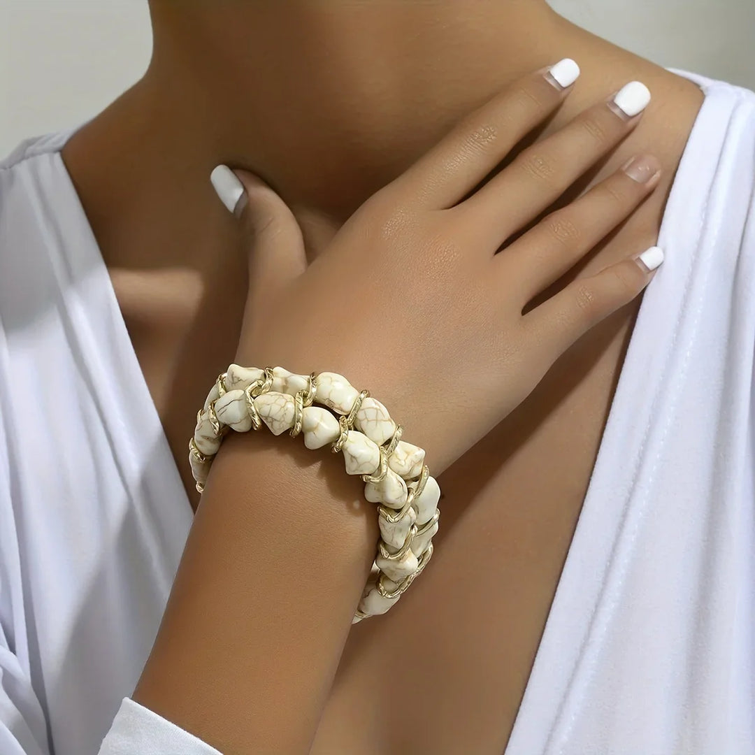 Gouden armband met turkooizen steen