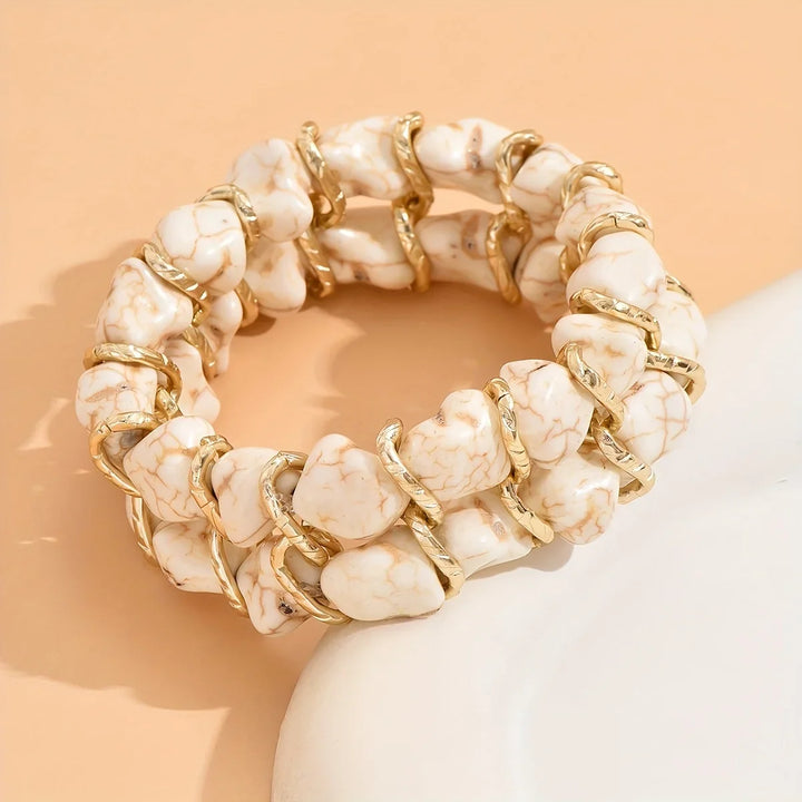 Gouden armband met turkooizen steen