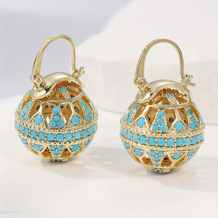 Turquoise filigraan bolvormige oorbellen