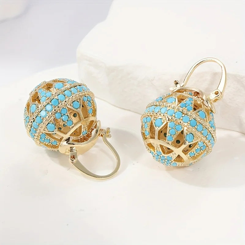Turquoise filigraan bolvormige oorbellen