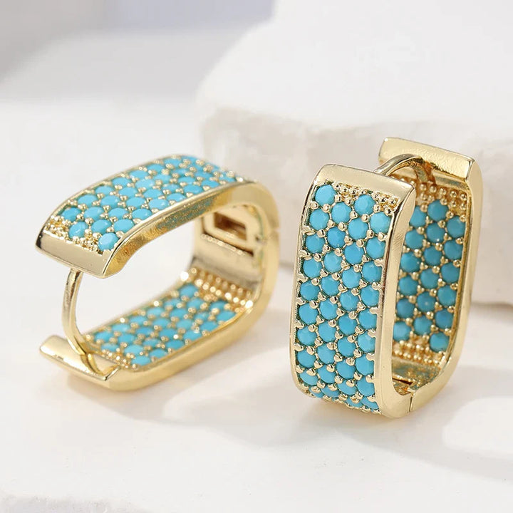 Turquoise Pavé gouden Huggie oorbellen