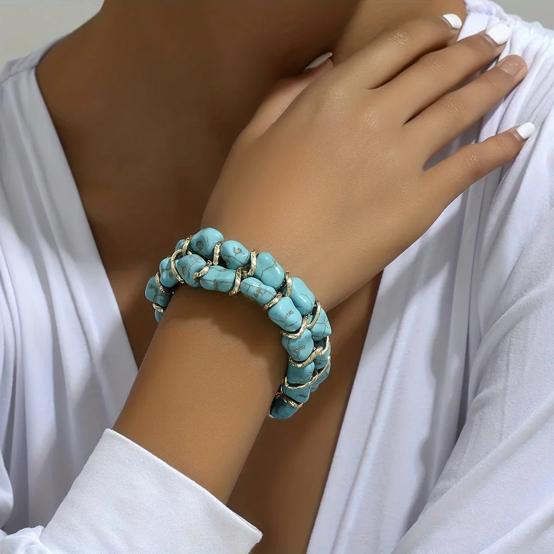 Gouden armband met turkooizen steen