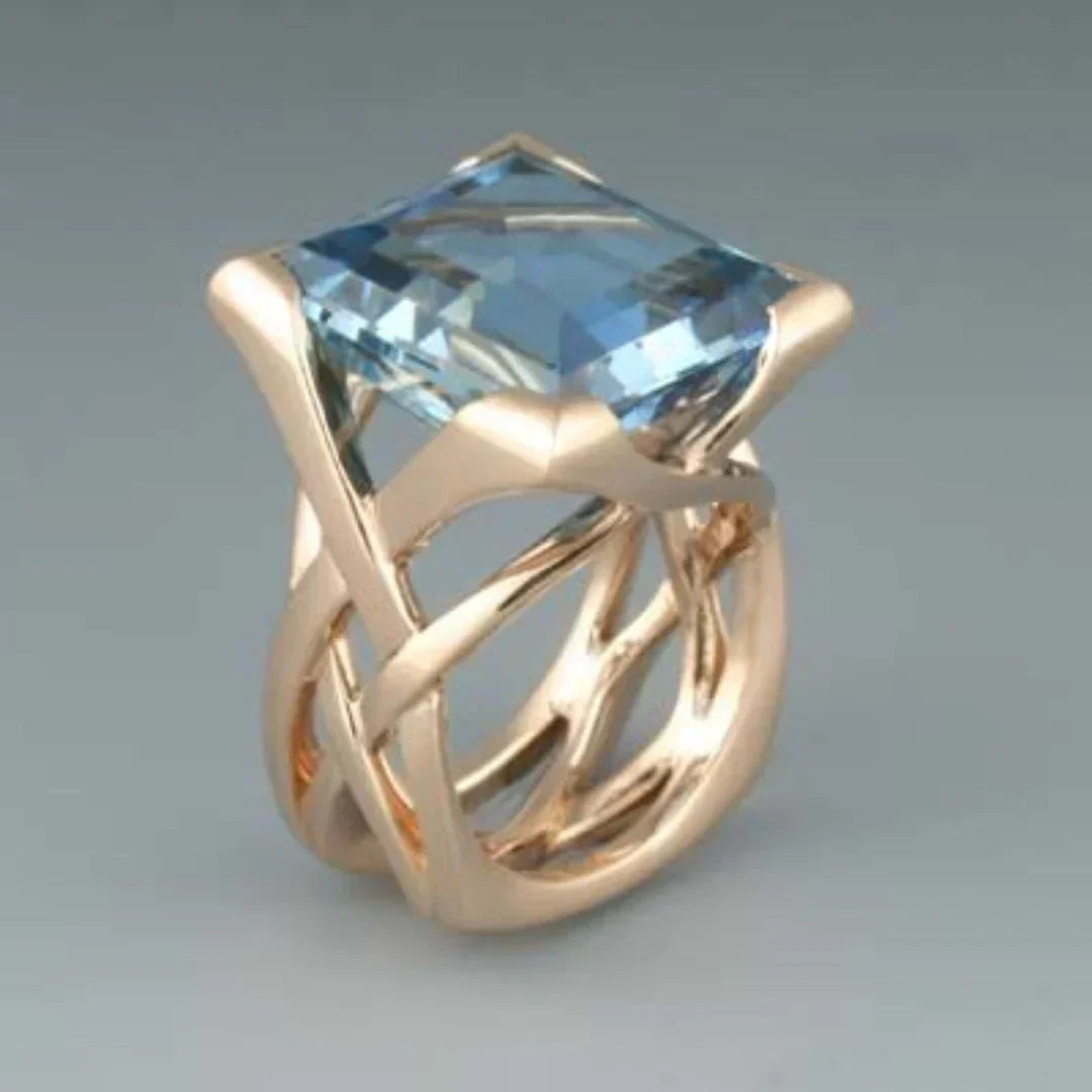 Roze Gouden Ring met Blauwe Zirkonia Steentjes