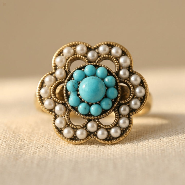 Turquoise en parelmoeren bloemenring